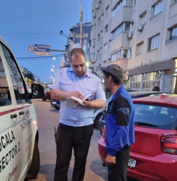 Parcagiii care cer bani ilegal șoferilor în Sectorul 2, amendați de Poliția Locală