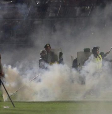 Indonesia policemen on trial for negligence over deadly football stampede