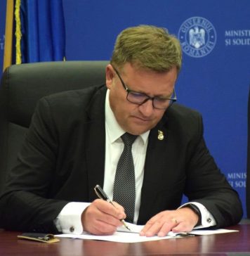 Ministrul Marius Budăi spune că statul român ar putea lua exemplul Belgiei, care taxează magazinele pentru fiecare casă self-service instalată