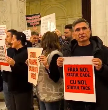 ”Cum ne-au luat ei, ia-le, Doamne, lor!” – Bolojan întâmpinat cu huiduieli la Parlament
