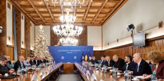 Negocieri la Guvern pe majorarea salariului minim. Bolojan: Ar avea o serie de efecte negative