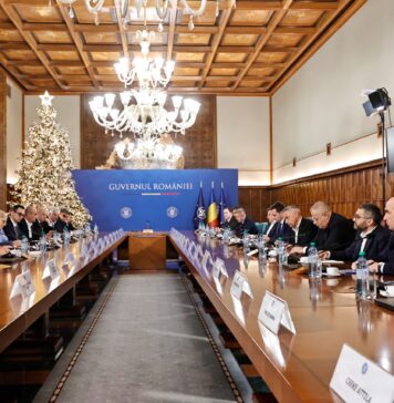 Negocieri la Guvern pe majorarea salariului minim. Bolojan: Ar avea o serie de efecte negative